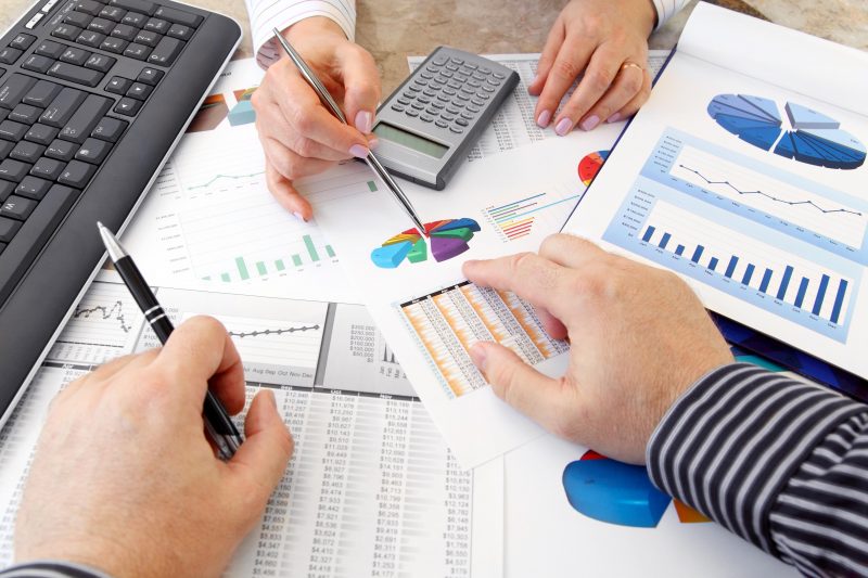 Accounting Fundamentals Online Graduate Certificate Image of Reports, Graphs, Accounting Tools and Hands
