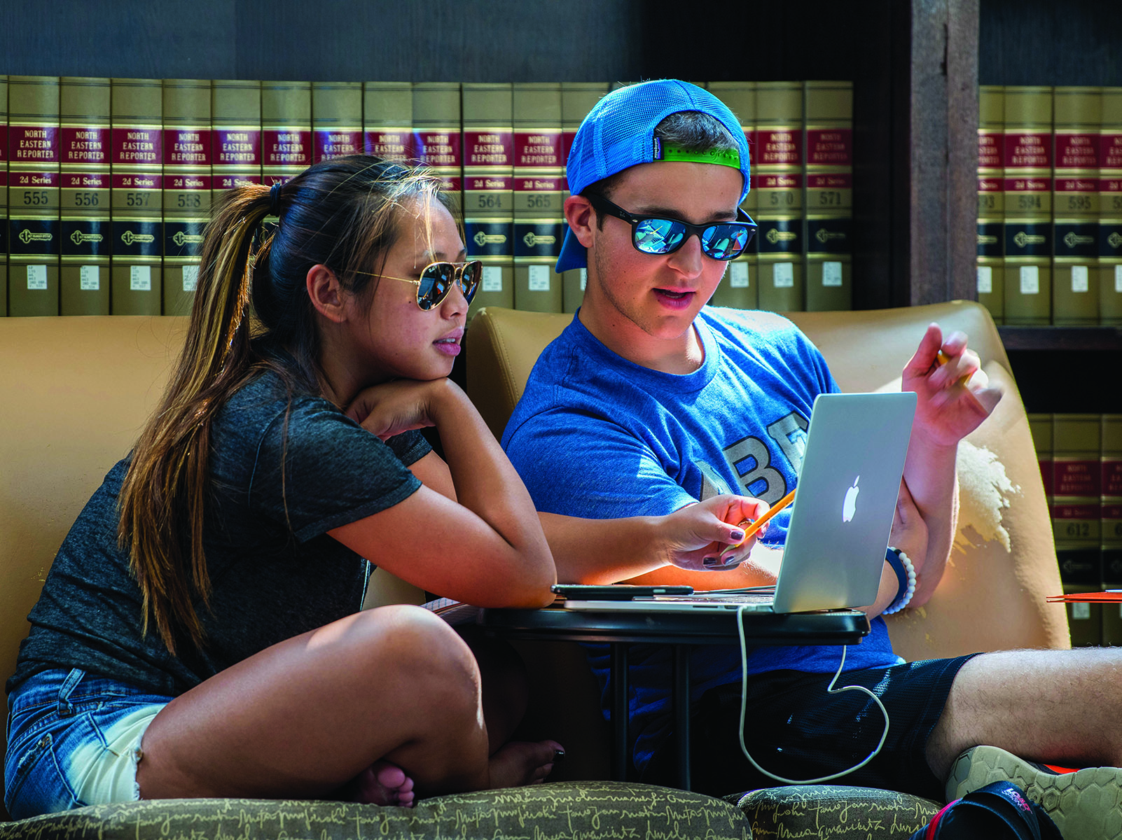 Students working on homework in the Wilbur Cross Reading Room.